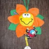 Подвесная детская музыкальная игрушка Цветочек фирмы Playgro